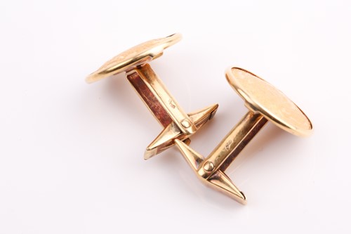 Lot 382 - A pair of coin cufflinks. Made from Austrian...