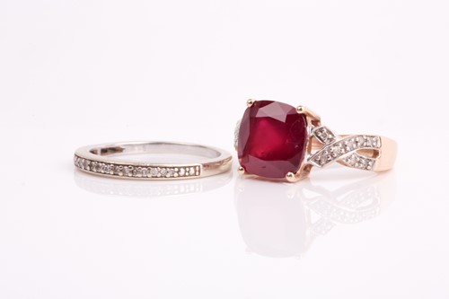 Lot 164 - A single stone ruby ring, the cushion-cut ruby,...