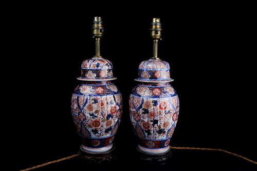 Lot 178 - A pair of Japanese imari vases and covers,...
