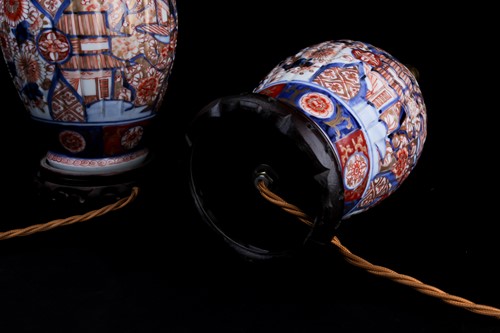 Lot 178 - A pair of Japanese imari vases and covers,...