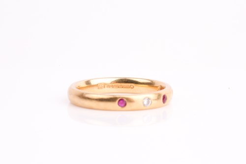 Lot 212 - A diamond and ruby half eternity ring, the...