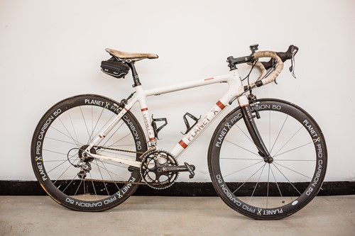 Lot 40 - A Planet X carbon fibre road bicycle, with...