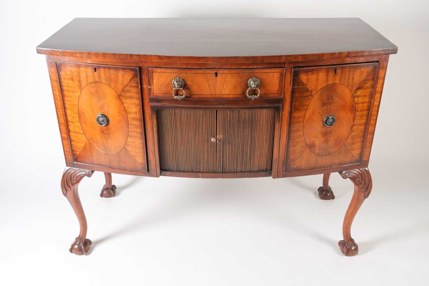 Lot 118 - A George III style mahogany bow fronted...