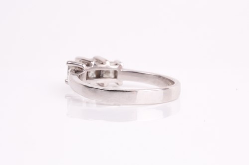 Lot 24 - An 18ct white gold and diamond ring, set with...