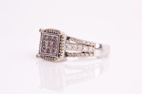 Lot 284 - A diamond and pink diamond 14ct gold cluster...