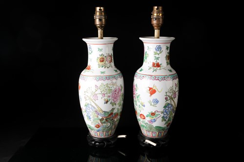 Lot 186 - A pair of Chinese famile rose porcelain vase...