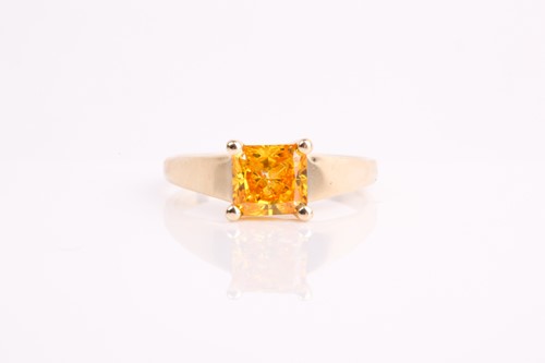 Lot 338 - A diamond ring, set with a princess-cut...