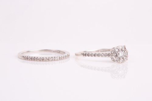 Lot 36 - A silver and diamond cluster engagement style...