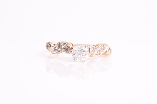Lot 150 - A yellow metal and diamond ring, set with a...