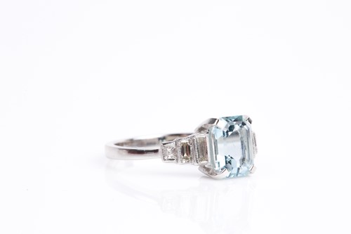 Lot 271 - An aquamarine and diamond ring, the step cut,...
