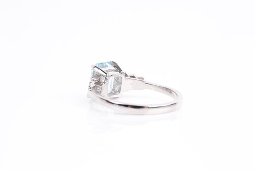 Lot 271 - An aquamarine and diamond ring, the step cut,...