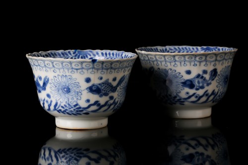 Lot 213 - A pair of Chinese, Kangxi blue and white...