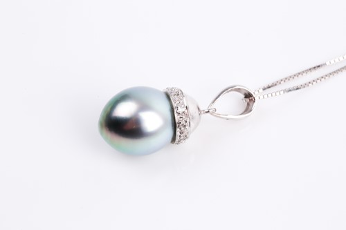 Lot 63 - A single stone Tahitian pearl and diamond...