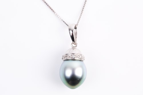 Lot 63 - A single stone Tahitian pearl and diamond...