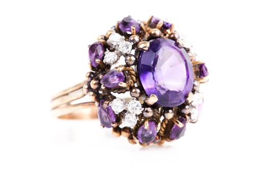 Lot 217 - A amethyst and diamond cluster cocktail ring,...