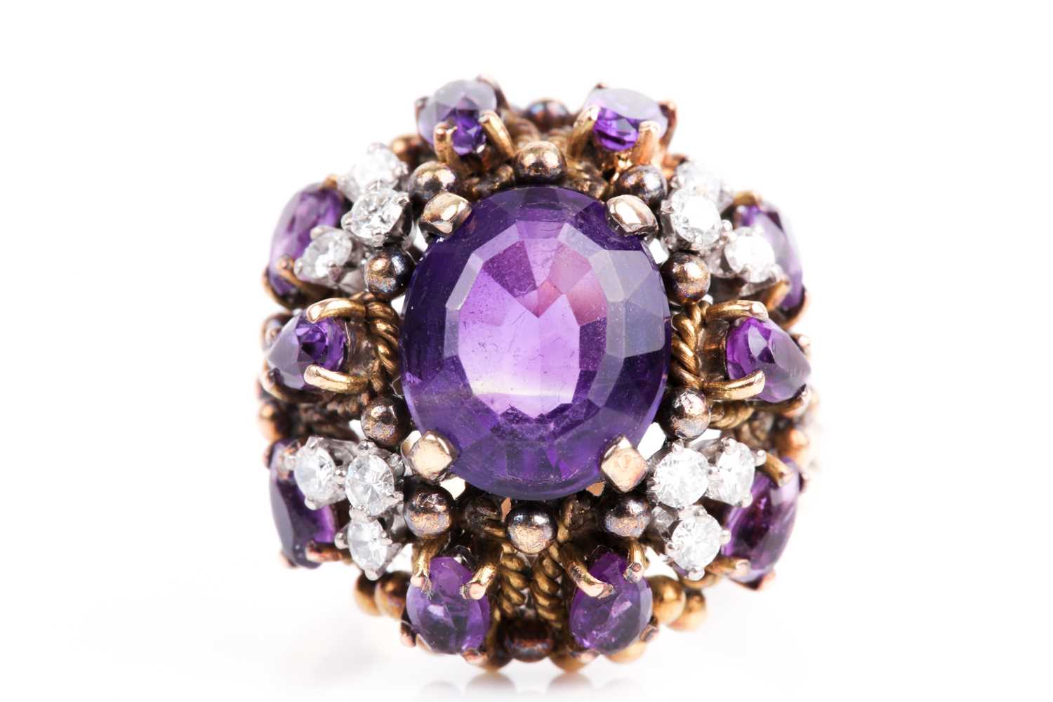 Lot 217 - A amethyst and diamond cluster cocktail ring,...