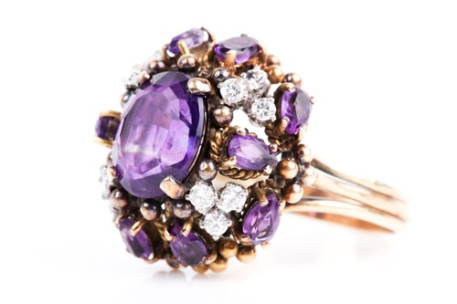 Lot 217 - A amethyst and diamond cluster cocktail ring,...