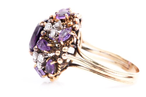 Lot 217 - A amethyst and diamond cluster cocktail ring,...