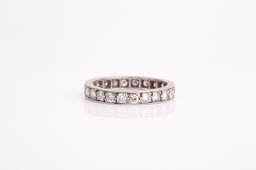Lot 242 - A diamond eternity ring, set with twenty four...