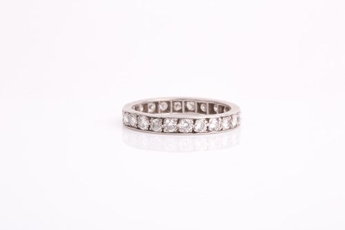 Lot 242 - A diamond eternity ring, set with twenty four...