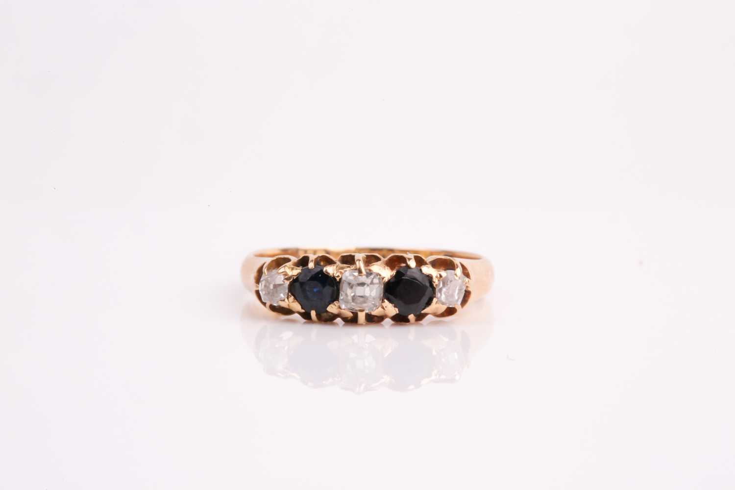Lot 39 - An 18ct yellow gold, diamond, and sapphire...