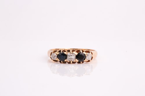 Lot 39 - An 18ct yellow gold, diamond, and sapphire...