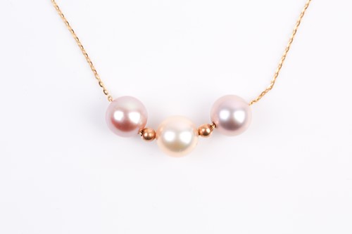 Lot 5 - A three stone mixed colour cultured pearl...
