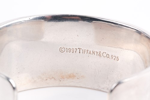 Lot 267 - A Tiffany & Co cuff bangle, the slightly...