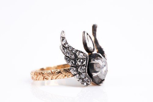 Lot 235 - An 18ct yellow gold, silver, and diamond ring,...