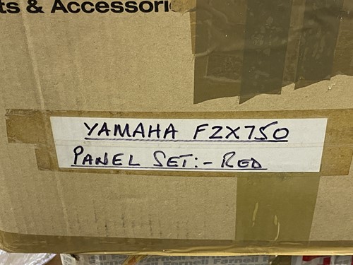 Lot 34 - A Yamaha FZX750 red panel set, two boxes of...