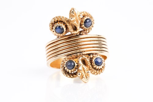 Lot 326 - A yellow metal and sapphire ring, in a Greek...
