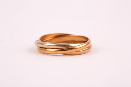Lot 322 - A Cartier 'Trinity' three colour gold ring;...