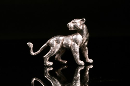 Lot 560 - A late 20th century cast silver miniature...