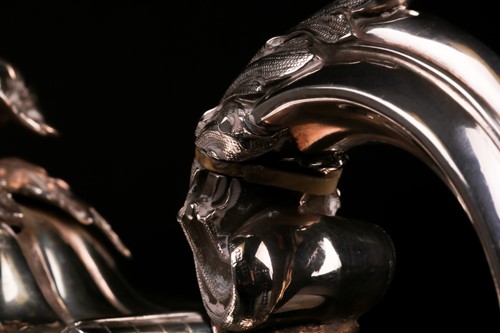 Lot 538 - An early Victorian silver teapot. London 1840...