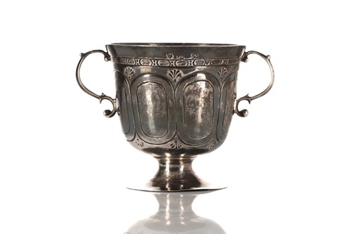 Lot 329 - A Charles II silver footed porringer, London...