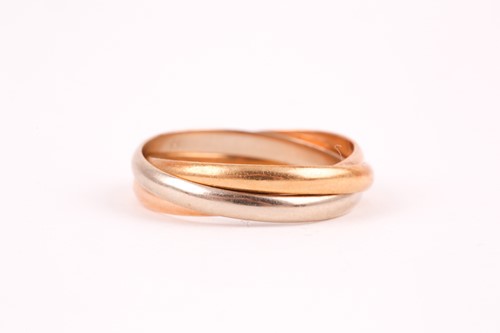 Lot 51 - A Cartier 'Trinity' three colour gold ring; in...