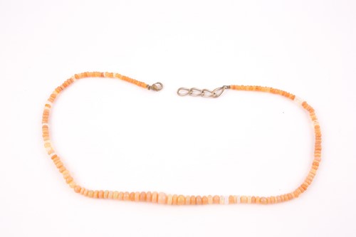 Lot 10 - A opal bead necklace, the graduated roundels...