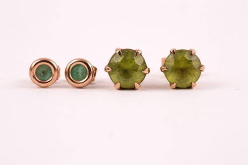 Lot 393 - A pair of single stone emerald earrings, in...