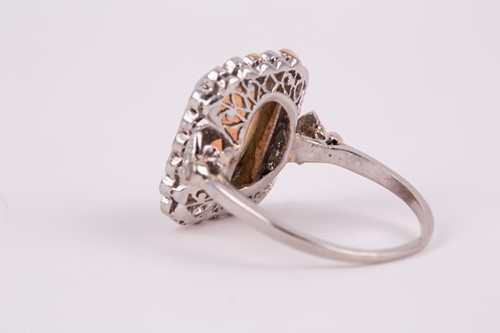 Lot 250 - A platinum, diamond, and opal cocktail ring,...