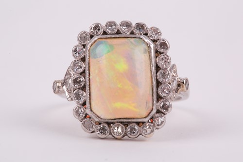 Lot 250 - A platinum, diamond, and opal cocktail ring,...