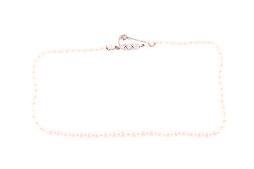 Lot 277 - A cultured pearl necklace, the graduated...