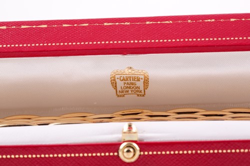 Lot 180 - Cartier. A late 20th century 18ct yellow gold...