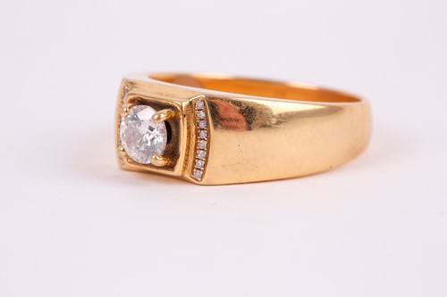 Lot 267 - A yellow metal and diamond ring, set with a...