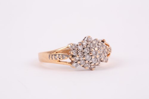Lot 196 - An 18ct yellow gold and diamond cluster ring,...