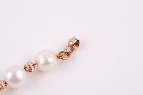 Lot 193 - A yellow metal and cultured pearl bracelet,...