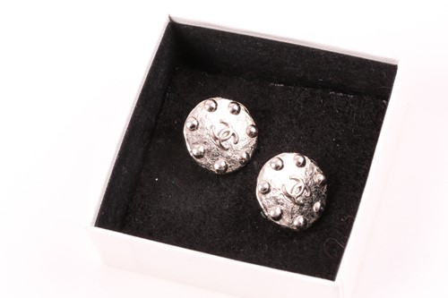 Lot 261 - Chanel. A pair of silver coloured vintage...