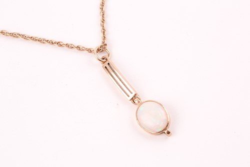 Lot 148 - A yellow metal and opal drop pendant,...