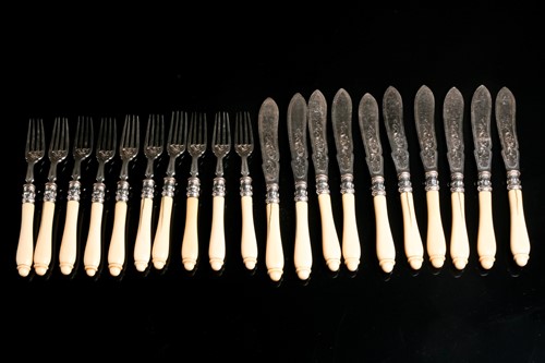 Lot 563 - A set for ten Victorian silver fish knives and...