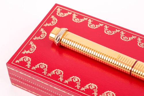 Lot 510 - A Cartier Must de Cartier ball-point pen, the...