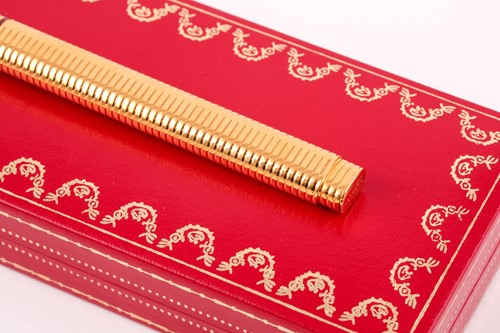 Lot 510 - A Cartier Must de Cartier ball-point pen, the...